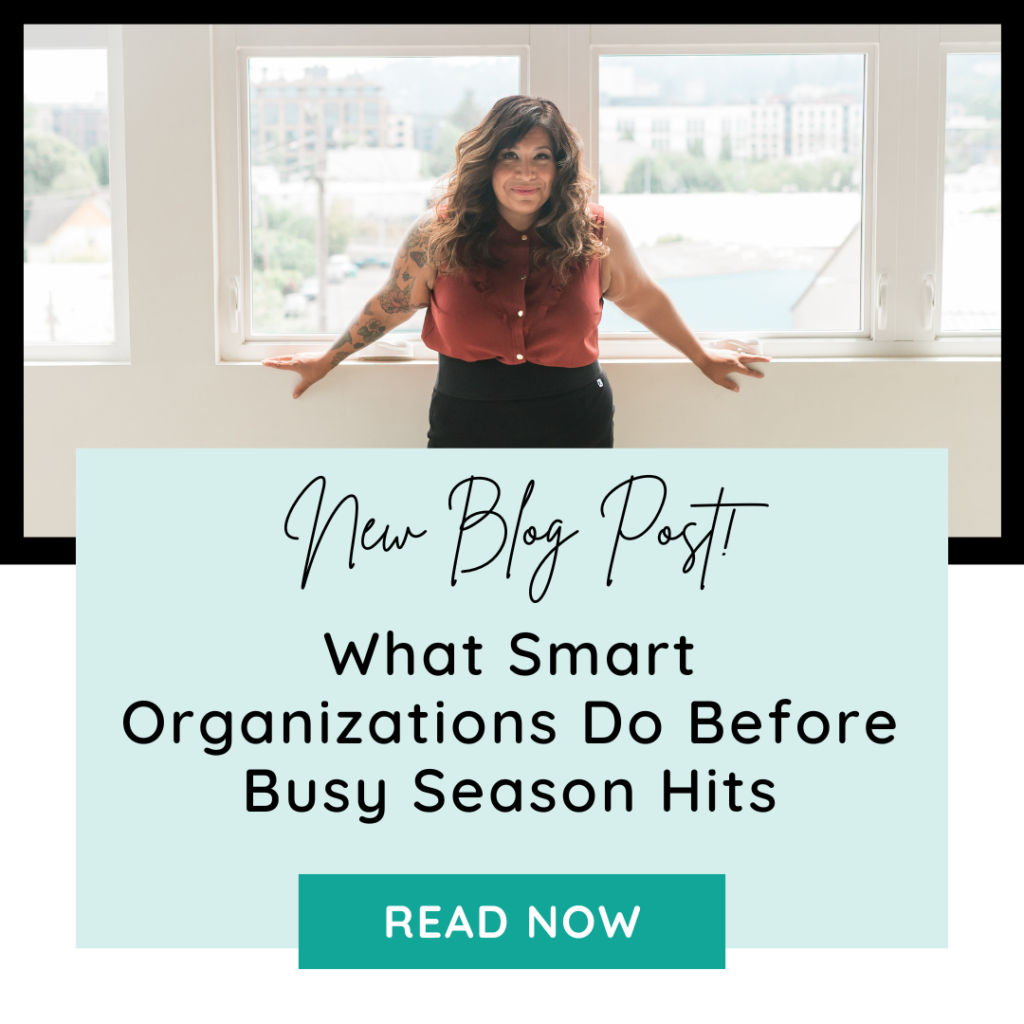 A woman stands in front of large windows above text announcing a new blog post titled "What Smart Organizations Do Before Busy Season Hits," featuring leadership strategies for organizational leaders, with a "Read Now" button.